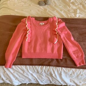 Day + Moon pink sweater with white accent ruffles